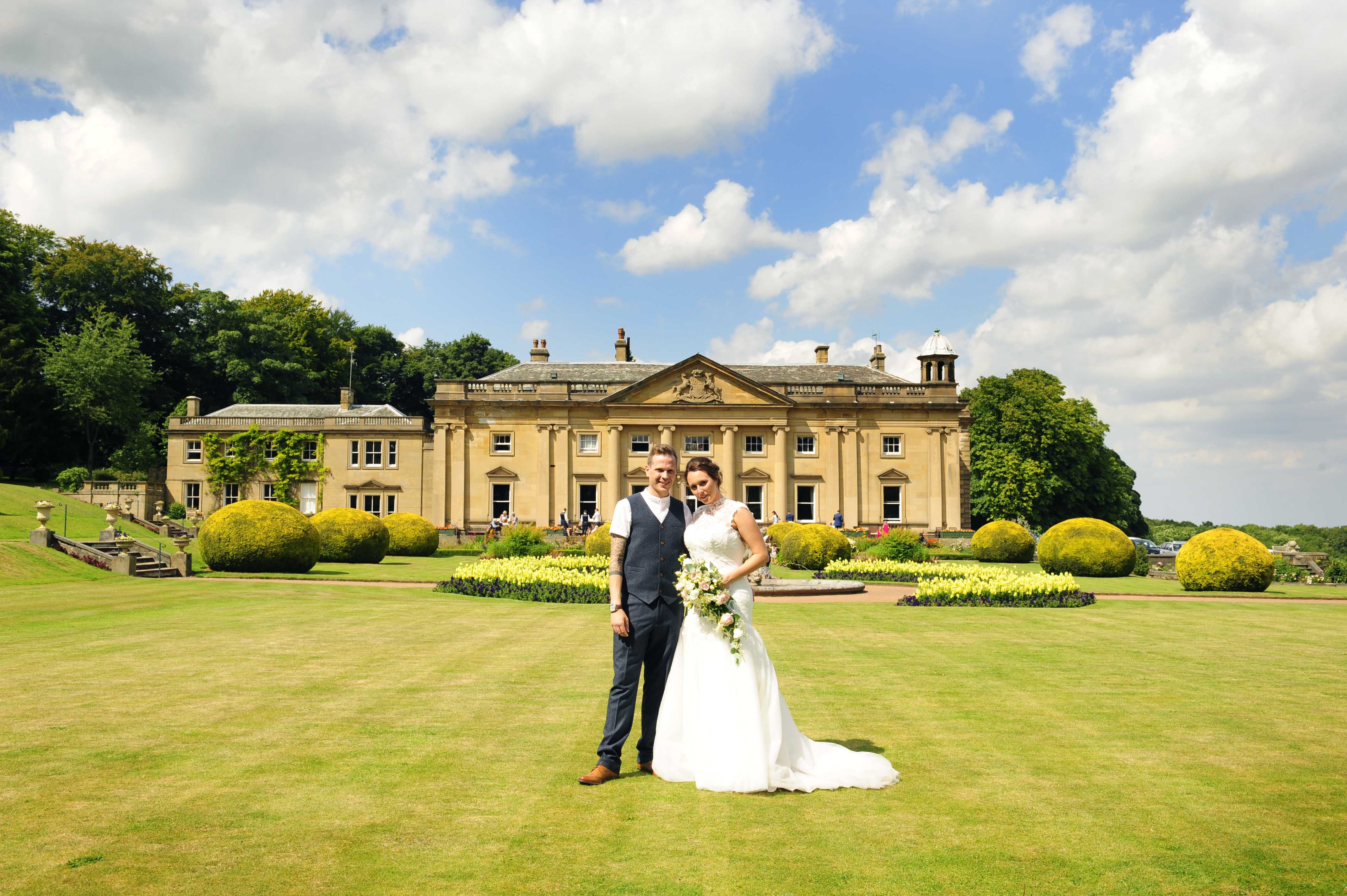 wedding photography picture of couple standing in front of wortley hall